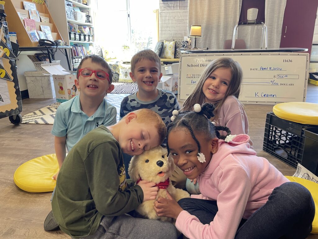 Students with an animatronic pet