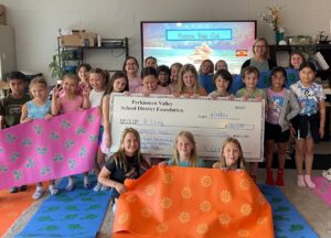 KLong and Class Mrs. Kathy Long and second graders post for recess yoga club